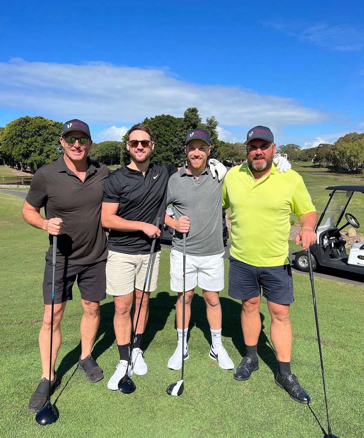 Group photograph on the course at a 4QTR golf day